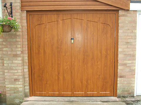 Side hung timber garage door installed in a Norfolk property