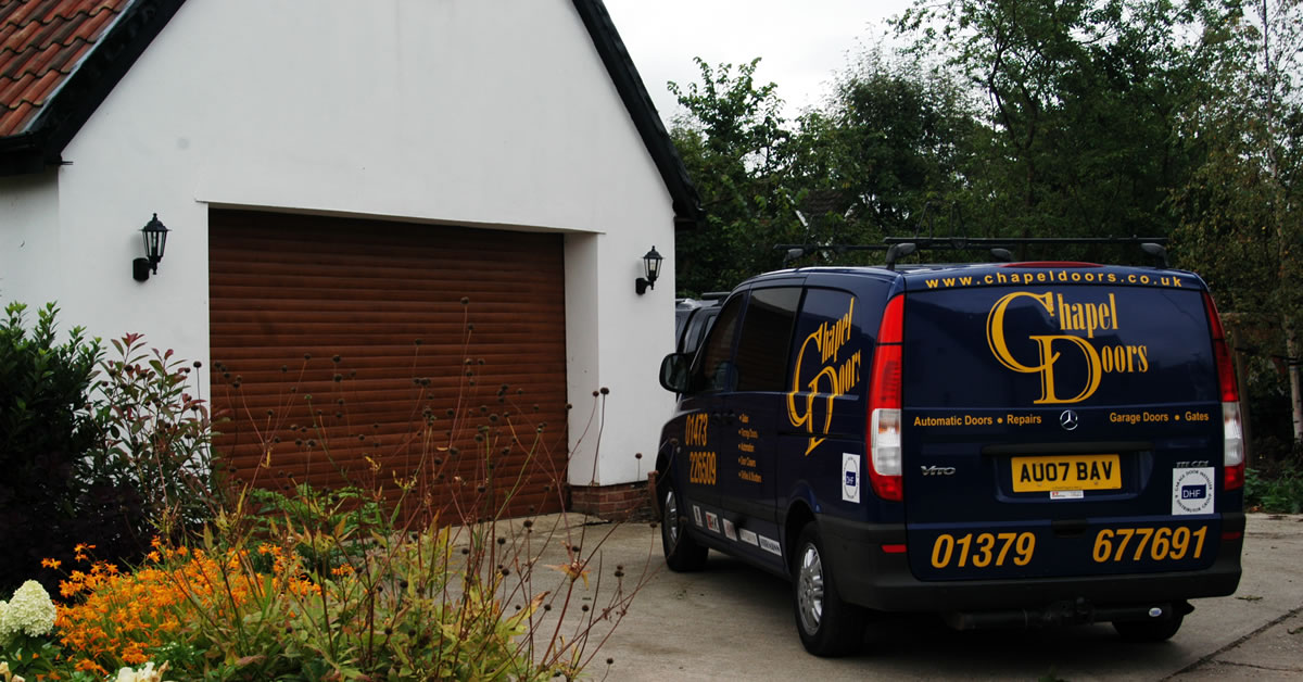 Chapel Doors van next to a freshly installed wood garage door