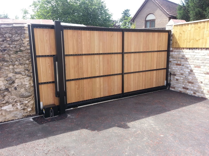 Steel and wood sliding gate installed in Suffolk